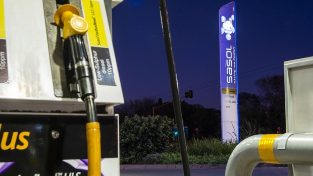 An illuminated light stands at the entrance to a Sasol Ltd. fuel station in Pretoria, South Africa, on Thursday, June 4, 2020. South Africa’s state-owned Central Energy Fund is considering buying assets that have been put on the block by fuel and chemical maker Sasol Ltd. as it seeks to restore itself to profitability. Photographer: Waldo Swiegers/Bloomberg