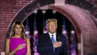 U.S. President Donald Trump, right, and U.S. First Lady Melania Trump listen to the National Anthem during the Republican National Convention at Fort McHenry National Monument and Historic Shrine in Baltimore, Maryland, U.S., on Wednesday, Aug. 26, 2020. Vice President Pence is making the case for a second term for himself and Trump capping a night at the convention designed to emphasize the military, law enforcement and public displays of patriotism.
