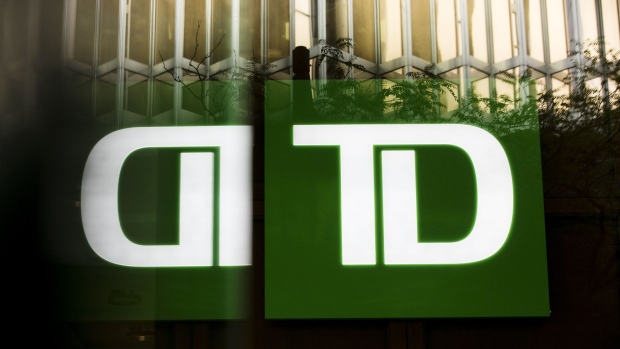 Toronto-Dominion (TD) Canada Trust signage is reflected on a building in the financial district of Toronto, Ontario, Canada, on Thursday, July 25, 2019. 