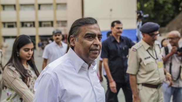 Mukesh Ambani, chairman and managing director of Reliance Industries Ltd., arrives at a polling station during the fourth phase of voting for national elections in Mumbai, India, on Monday, April 29, 2019. India’s financial capital went to the polls today with billionaires, celebrities and slum dwellers among those lining up to elect lawmakers they hope will fix Mumbai’s crumbling and stretched infrastructure.