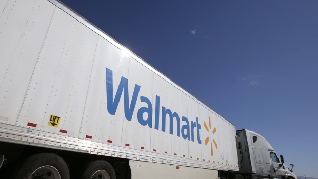 A Wal-Mart Stores Inc. tractor trailer truck departs the company's distribution center in Washington, Utah, U.S., on Friday, Sept. 23, 2016. 