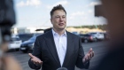 Elon Musk speaks at the site of the new Tesla Gigafactory near Gruenheide on Sept. 3.