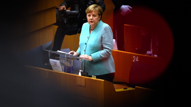 Angela Merkel, Germany's chancellor, addresses the European Parliament as she outlines plans for Germany's six-month presidency of the European Union, in Brussels, Belgium, on Wednesday, July 8, 2020. The German leader has stressed the grave challenges the EU faces this year, including a slumping economy, wrangling over the U.K.'s exit and the battle to tame the coronavirus pandemic.