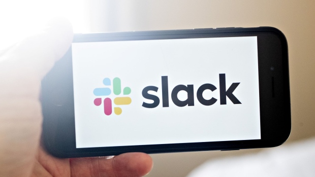 Slack Technologies Inc. signage is displayed on a smartphone in an arranged photograph taken in Arlington, Virginia, U.S., on Tuesday, Sept. 8, 2020.