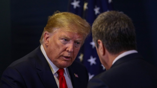 U.S. President Donald Trump, left, speaks to Roberto Azevedo, director general of the World Trade Organization (WTO), during a news conference on day two of the World Economic Forum (WEF) in Davos, Switzerland, on Wednesday, Jan. 22, 2020.