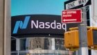 Signage is displayed outside the Nasdaq MarketSite in the Times Square neighborhood of New York, U.S., on Monday, July 20, 2020. 