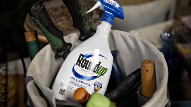 A bottle of Bayer AG Roundup brand weedkiller is arranged for a photograph in a garden shed in Princeton, Illinois, U.S., on Thursday, March 28, 2019. Bayer vowed to keep defending its weedkiller Roundup after losing a second trial over claims it causes cancer, indicating that the embattled company isn't yet ready to consider spending billions of dollars to settle thousands of similar lawsuits. Photographer: Daniel Acker/Bloomberg
