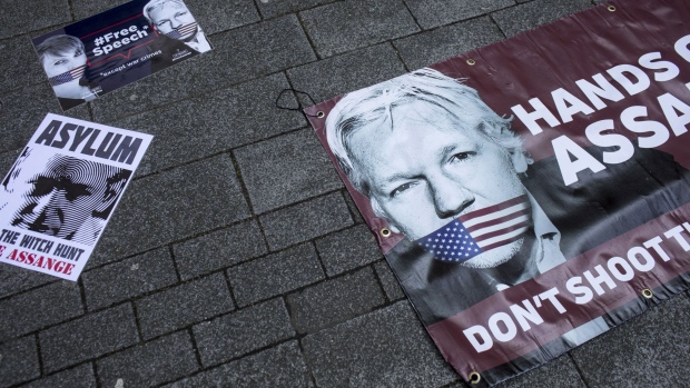Banners in support of WikiLeaks founder Julian Assange lie on the ground outside the Westminster Magistrates' Court in London in 2019.