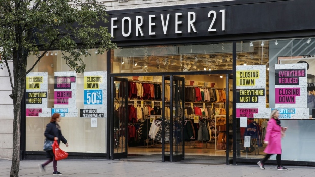 Closing down and sale signs sit in the widows of a Forever 21 Inc. store in London, U.K, on Thursday, Oct. 31, 2019.