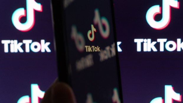 The logo for ByteDance Ltd.'s TikTok app is displayed on a smartphone in an arranged photograph in Beijing, China, on Wednesday, Sept. 2, 2020. U.S. President Donald Trump said he's told people involved in the sale of the U.S. assets of ByteDance's TikTok that the deal must be struck by Sept. 15 and the federal government must be "well compensated," or the service will be shut down.