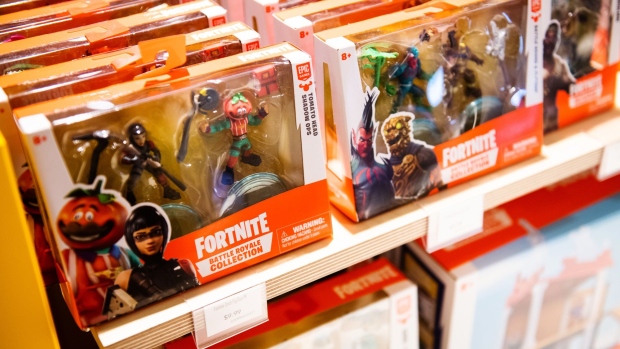 Epic Games Inc. Fortnite figurines sit on display at a Toys "R" Us Inc. store in Paramus, New Jersey, U.S., on Tuesday, Nov. 26, 2019. The new store in the Garden State Plaza is the first of 10 locations planned to be operational by the end of next year. Photographer: Mark Kauzlarich/Bloomberg