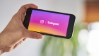 Facebook Inc. Instagram signage is displayed on an Apple Inc. iPhone in an arranged photograph taken in the Brooklyn Borough of New York, U.S., on Sunday, Jan. 26, 2020. Facebook Inc. is scheduled to release earnings figures on January 29. 
