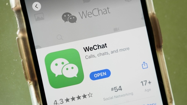 WASHINGTON, DC - AUGUST 07: In this photo illustration, the WeChat app is displayed in the App Store on an Apple iPhone on August 7, 2020 in Washington, DC. On Thursday evening, President Donald Trump signed an executive order that bans any transactions between the parent company of TikTok, ByteDance, and U.S. citizens due to national security reasons. The president signed a separate executive order banning transactions with China-based tech company Tencent, which owns the app WeChat. Both orders are set to take effect in 45 days. (Photo Illustration by Drew Angerer/Getty Images)