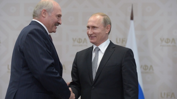 UFA, RUSSIA - JULY 8: In this handout image supplied by Host Photo Agency / RIA Novosti, President of the Russian Federation Vladimir Putin (R) meets President of the Republic of Belarus Alexander Lukashenko during the BRICS/SCO Summits - Russia 2015 on July 08, 2015 in Ufa, Bashkortostan, Russia. (Photo by Sergey Guneev/Host Photo Agency/Ria Novosti via Getty Images)
