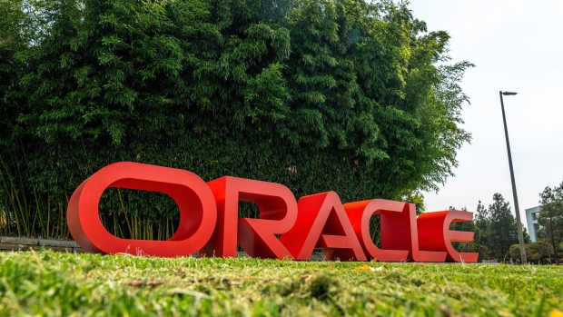 Signage is displayed outside the Oracle Corp. headquarters campus in Redwood City, California, U.S., on Tuesday, Aug. 18, 2020. Oracle Corp., the world's second-largest software maker, is weighing a surprise bid for part of TikTok's business, seeking to rival Microsoft Corp. in the race to acquire the viral video streaming app, according to people familiar with the matter. Photographer: David Paul Morris/Bloomberg