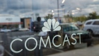Signage is displayed in the window of a Comcast Corp. Xfinity store in King Of Prussia, Pennsylvania, U.S., on Tuesday,