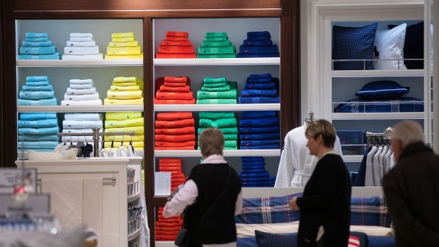 A selection of Ralph Lauren Corp. bath towels sit stacked on display stands inside a Galeria Kaufhof department store, operated by Hudson's Bay Co., in Berlin, Germany, on Wednesday, Dec. 6, 2017. Austrian property developer Rene Benko is taking a second run at consolidating Germany's dusty department stores, making an unsolicited bid for the Kaufhof chain now owned by Toronto-based Hudson's Bay. Photographer: Krisztian Bocsi/Bloomberg