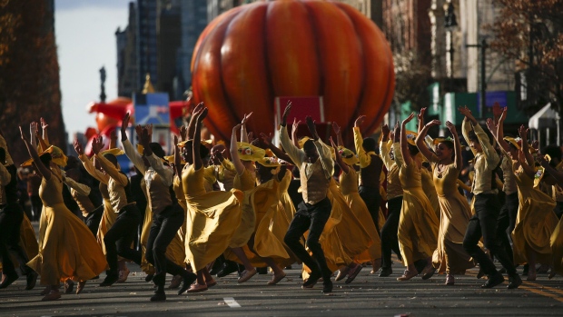 People dance during the annual Macy’s Thanksgiving Day Parade in New York in 2019.