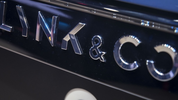A Lynk & Co. badge is seen on the wheel of an 01 hybrid sport utility vehicle (SUV), manufactured by Geely Automobile Holdings Ltd., at the Auto Shanghai 2017 vehicle show in Shanghai, China, on Wednesday, April 19, 2017. Auto Shanghai runs through to April 28. Photographer: Qilai Shen/Bloomberg