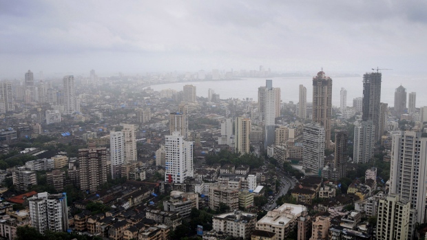 Buildings rise into the Mumbai skyline as seen from the Imperial residential towers in the Tardeo area of Mumbai, India, on Monday, July 21, 2010.