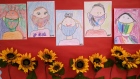 Drawings of children wearing masks adorn a hallway at Stark Elementary School on September 16, 2020 in Stamford, Connecticut Photographer: John Moore/Getty Images