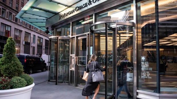 People enter JPMorgan Chase & Co. headquarters in New York on Sept. 21. Photographer: Michael Nagle/Bloomberg