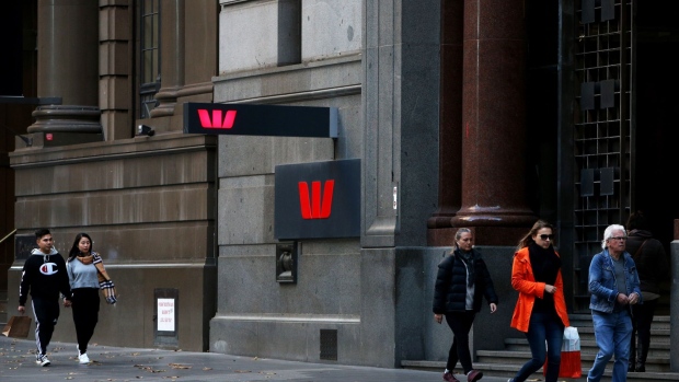 Pedestrians walk past a Westpac Banking Corp. branch in Sydney, Australia, on Tuesday, June 23, 2020. While the Australian economy lost more than 800,000 jobs in April and May, more timely indicators are painting a better picture. Outside of a small outbreak in the southern state of Victoria, authorities have flattened the Covid-19 infection curve and are reopening the economy earlier than expected.