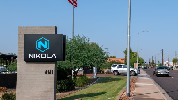 Signage is displayed outside Nikola Corp. headquarters in Phoenix, Arizona, U.S., on Tuesday, Sept. 15, 2020. Nikola Corp. shares fell as much as 10.4%, resuming its decline as investors reacted to word of a U.S. Securities and Exchange Commission investigation into allegations it deceived investors about its prospects.