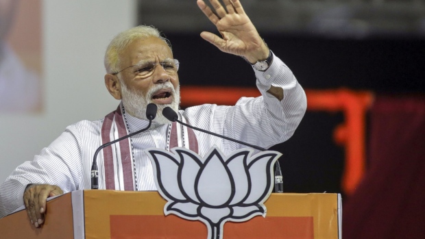 Narendra Modi, India's prime minister, speaks during a rally in Mumbai, India, on Friday, April 26, 2019. Modi's Bharatiya Janata Party (BJP) won the biggest majority in three decades in 2014 largely because the party more than doubled its tally in urban areas, while Congress lost 96 percent of the seats.