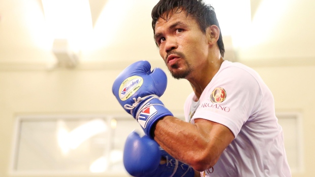 MACAU - NOVEMBER 20: Manny Pacquiao trains during a workout session at The Venetian on November 20, 2014 in Macau, Macau. (Photo by Chris Hyde/Getty Images) Photographer: Chris Hyde/Getty Images AsiaPac