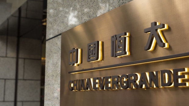Signage is displayed outside the China Evergrande Centre in Hong Kong, China, on Friday, Sept. 25, 2020. China Evergrande Group is facing a crisis of confidence among creditors who've lent the world's most indebted developer more than $120 billion.