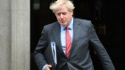 Boris Johnson, U.K. prime minister, departs from number 10 Downing Street on his way to make a statement in Parliament in London, U.K., on Tuesday, Sept. 22, 2020. Former U.K. Prime Minister Theresa May slammed Boris Johnson's plan to break international law over Brexit, and said she won’t vote for it in Parliament.