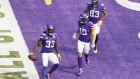 (L-R) Dalvin Cook #33, Adam Thielen #19 and Tyler Conklin #83 of the Minnesota Vikings celebrate a touchdown against the Tennessee Titans by Cook during the first quarter of the game at U.S. Bank Stadium on September 27, 2020 in Minneapolis, Minnesota. 