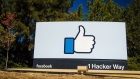 Signage is displayed outside Facebook Inc. headquarters in Menlo Park, California, U.S., on Tuesday, Oct. 30, 2018.