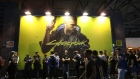 Attendees queue beside a CD Projekt Red SA Cyberpunk 2077 video game sign at the Gamescom computer games industry event in Cologne, Germany, on Tuesday, Aug. 20, 2019. Gamescom is the world's largest gaming convention and runs from August 20 to 24.