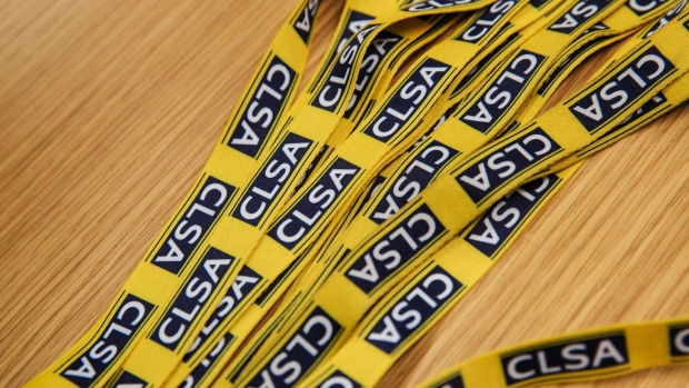 The CLSA Ltd. logo is displayed on lanyards at the company's office in Hong Kong, China, on Wednesday, July 5, 2017. Citic Securities paid about $1.2 billion for CLSA as it stepped up efforts to expand abroad, and merged its Hong Kong investment-banking operations with those of CLSA in 2015. Photographer: Anthony Kwan/Bloomberg