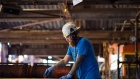 A worker processes logs at a sawmill in Chemainus, British Columbia, Canada, on Wednesday, Sept. 3, 2020. Lumber futures for November delivery dropped 4.1% to $670.50 per 1,000 board feet on the Chicago Mercantile Exchange, the lowest for a most-active contract since Aug. 11. Photographer: James MacDonald/Bloomberg