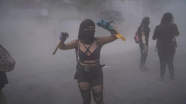 MEXICO CITY, MEXICO - SEPTEMBER 28: A protester reacts after being pepper sprayed during a demonstration in favor of the decriminalization of abortion on the International Safe Abortion Day on September 28, 2020 in Mexico City, Mexico. In Mexico, only two states allow legal abortions in women up to twelve weeks of pregnancy. (Photo by Toya Sarno Jordan/Getty Images)