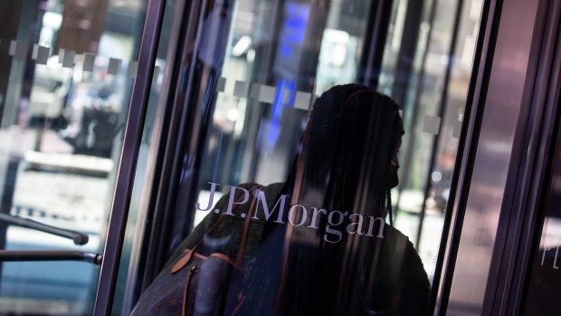 A person enters JPMorgan Chase & Co. headquarters in New York. Photographer: Michael Nagle/Bloomberg