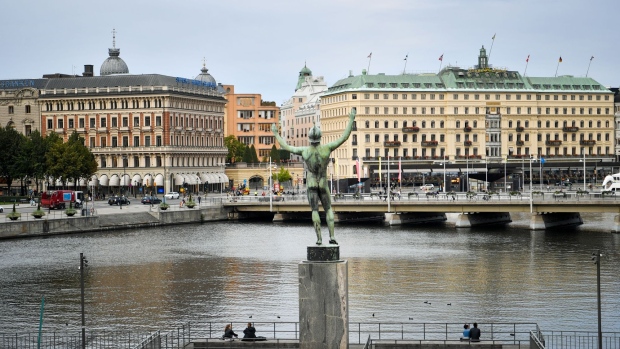 The Solsangaren sculpture stands in view the Svenska Handelsbanken AB headquarters in Stockholm on Sept. 21. Photographer: Mikael Sjoberg/Bloomberg