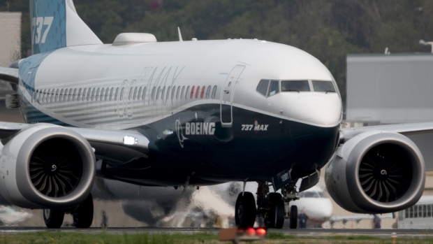 The Boeing Co. 737 Max airplane lands during a test flight in Seattle, Washington, U.S., on Wednesday, Sept. 30, 2020. Federal Aviation Administration chief Steve Dickson, who is licensed to fly the 737 along with several other jetliners from his time as a pilot at Delta Air Lines Inc., will be at the controls of a Max that has been updated with a variety of fixes the agency has proposed and may soon make mandatory. Photographer: Chona Kasinger/Bloomberg