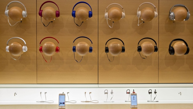 Beats by Dre headphones hang on display during a media preview of the new Apple Inc. Michigan Avenue store in Chicago, Illinois, U.S., on Thursday, Oct. 19, 2017. The building features exterior walls made entirely of glass with four interior columns supporting a 111-by-98 foot carbon-fiber roof, designed to minimize the boundary between the city and the Chicago River.