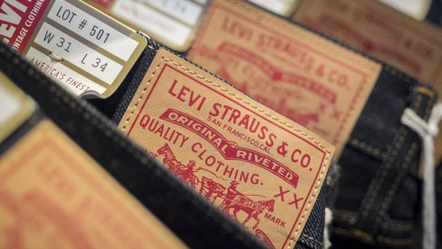 Levi Strauss & Co. labels are seen on jeans for sale inside the company's flagship store in San Francisco, California, U.S., on Monday, March 18, 2019. Levi Strauss & Co.'s initial public offering, currently set at 36.7 million shares seen pricing at $14 to $16 each, is expected to price on March 20 according to the NYSE website. Photographer: David Paul Morris/Bloomberg