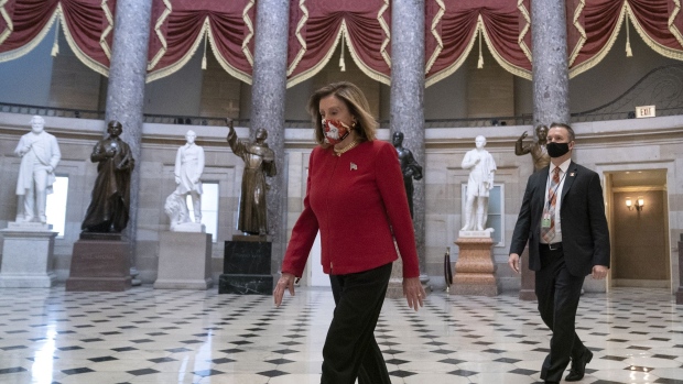 Nancy Pelosi walks to the House Floor at the U.S. Capitol in Washington, D.C., on Oct. 6.