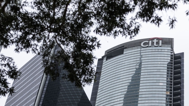 The Citigroup Inc. logo is displayed atop the Champion Tower, right, in Hong Kong, China, on Saturday, March 23, 2019