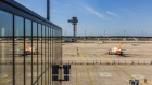 Passenger aircraft, operated by easyJet Plc, stand on the tarmac near the flight control tower at Berlin Brandenburg Airport (BER), operated by Flughafen Berlin Brandenburg GmbH, in Berlin, Germany, on Thursday, July 30, 2020. The German capital’s BER airport, which was originally scheduled to open in October 2011, will have its inaugural flight on Oct. 31. Photographer: Rolf Schulten/Bloomberg