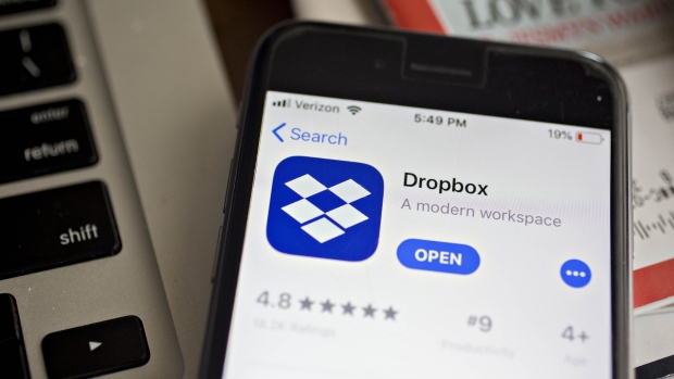 The Dropbox Inc. application is displayed in the App Store on an Apple Inc. iPhone in an arranged photograph taken in Washington, D.C., U.S., on Tuesday, Aug. 7, 2018. Dropbox Inc. is scheduled to release earnings figures on August 9. Photographer: Andrew Harrer/Bloomberg