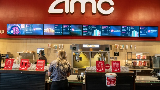 A customer visits the concession stand at an AMC Entertainment Holdings Inc. movie theater in Austin, Texas, U.S., on Thursday, Aug. 20, 2020. AMC will be reopening more than 100 theaters across the country Thursday, about one-sixth of its locations, with plans to open more in the coming weeks.