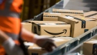 Packages sit on a conveyor belt at an Amazon.com Inc. fulfilment center in Kegworth, U.K., on Monday, Oct. 12, 2020. Prime Day, a two-day shopping event Amazon unveiled in 2015 to boost sales during the summer lull, usually occurs in July, but this year got pushed to Oct. 13 in 19 countries, including Brazil, with over 1 million products for sale worldwide. Photographer: Chris Ratcliffe/Bloomberg
