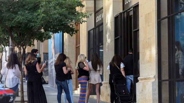 Shoppers queue outside a Louis Vuitton store in Beirut, Lebanon on June 27.